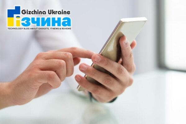 202102close up male hands using smartphone